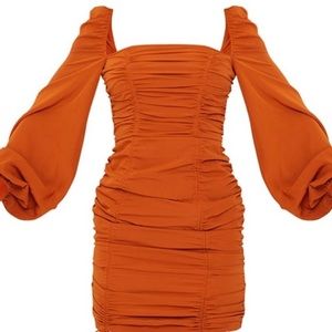 🔴SOLD🔴NWT - Rust Ruched Bodycon Dress